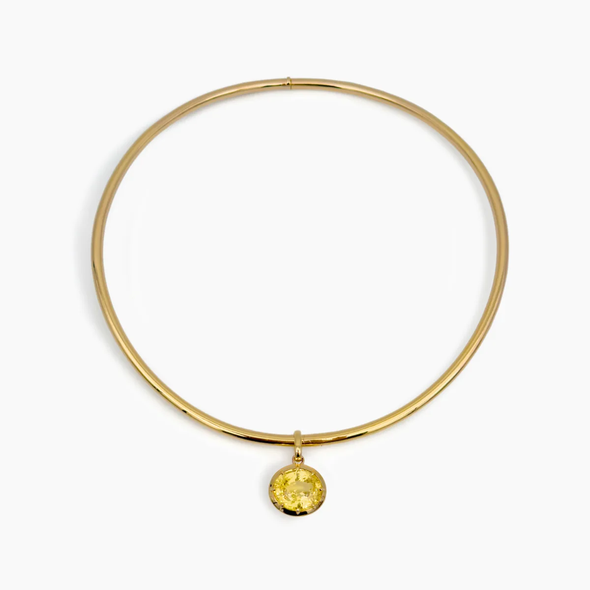 Drop of Sun bespoke 18-karat gold torque choker with a 13.12 ct unheated yellow sapphire from Sri Lanka, made in Dubai by Studio ALOI
