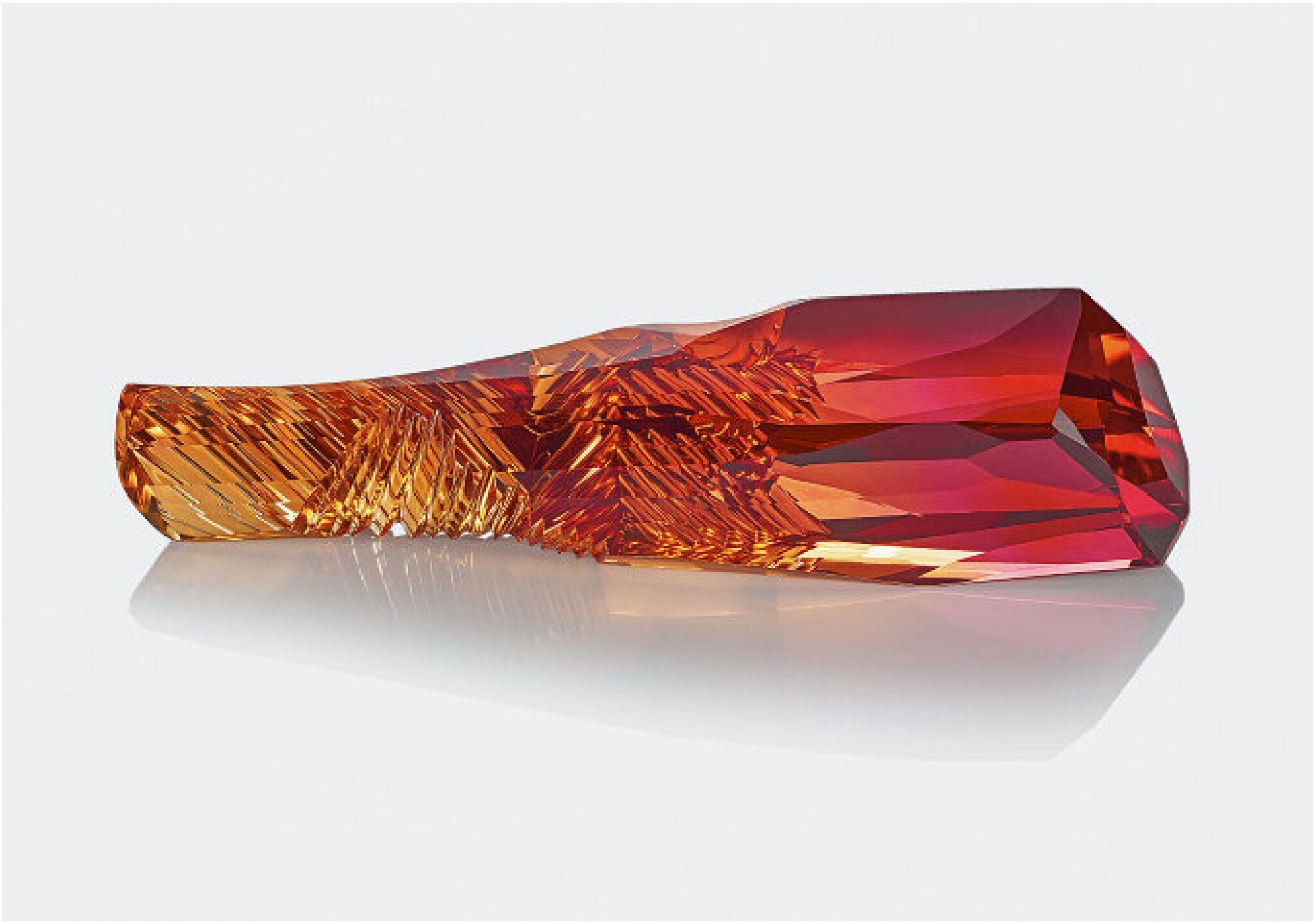 Large imperial topaz carving photographed on a white background