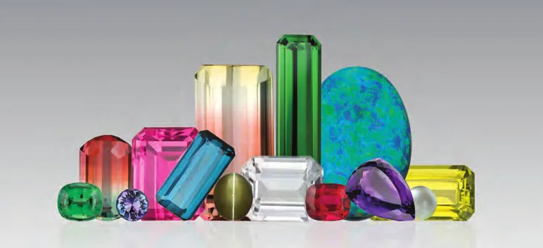 Group of fine faceted coloured gemstones arranged together