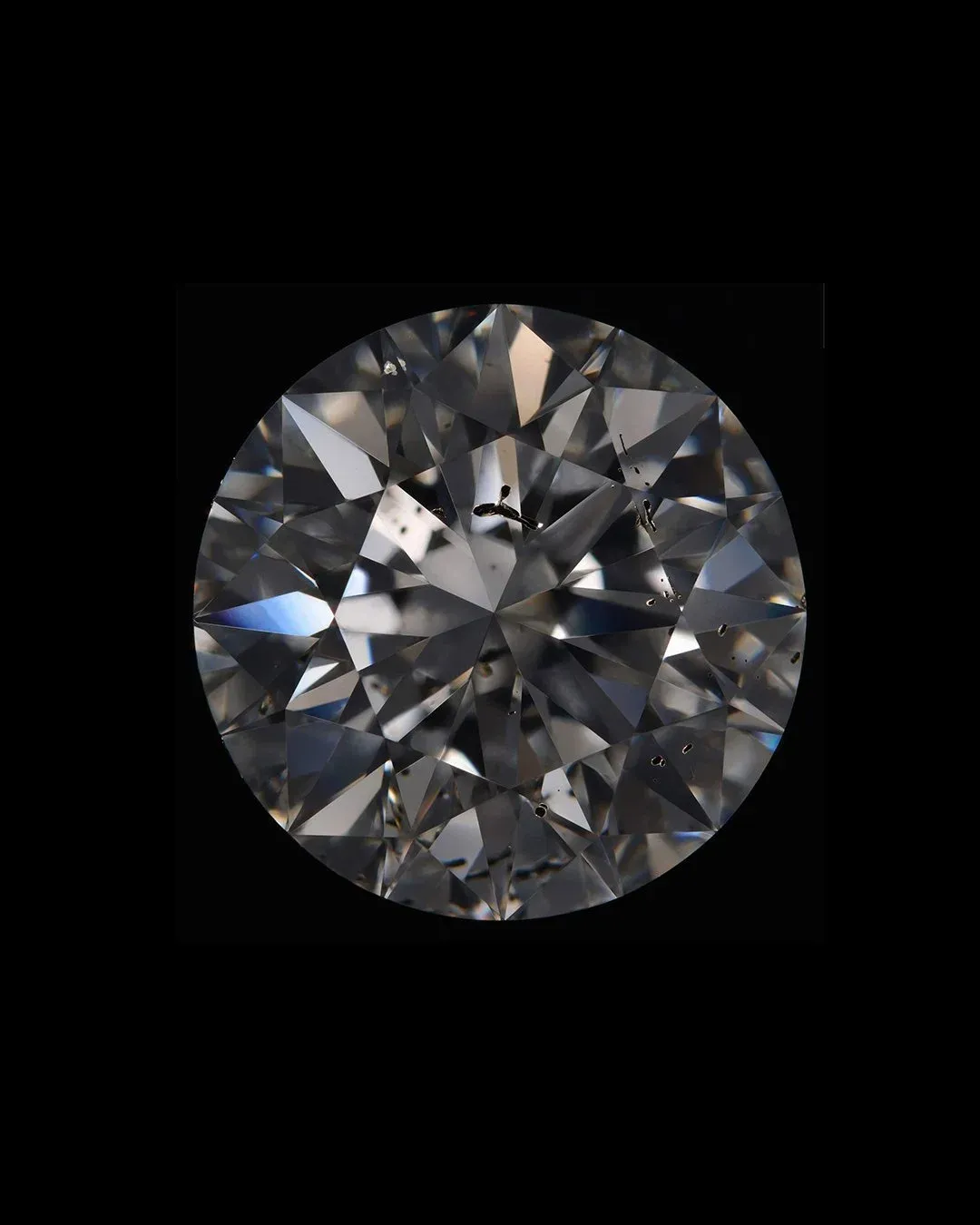 Round diamond showing unique inclusions that serve as a natural fingerprint and proof of authenticity.
